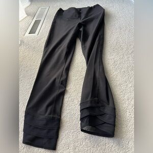Comfy yoga pants/leggins in black with a cute sheer accent at the bottom, Size S